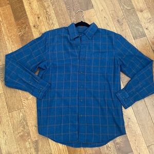 Arrow brand flannel. Size medium. Darker blue with orange